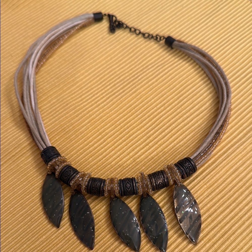 Black and Gold Feather Pendant Necklace with Multi-Strand Design